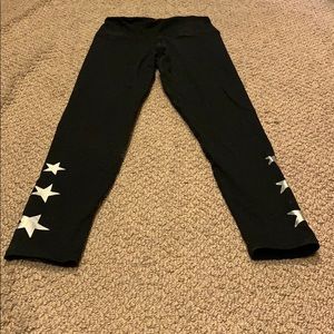 Black leggings with silver stars on the leg